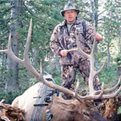 Man in Camo with Elk